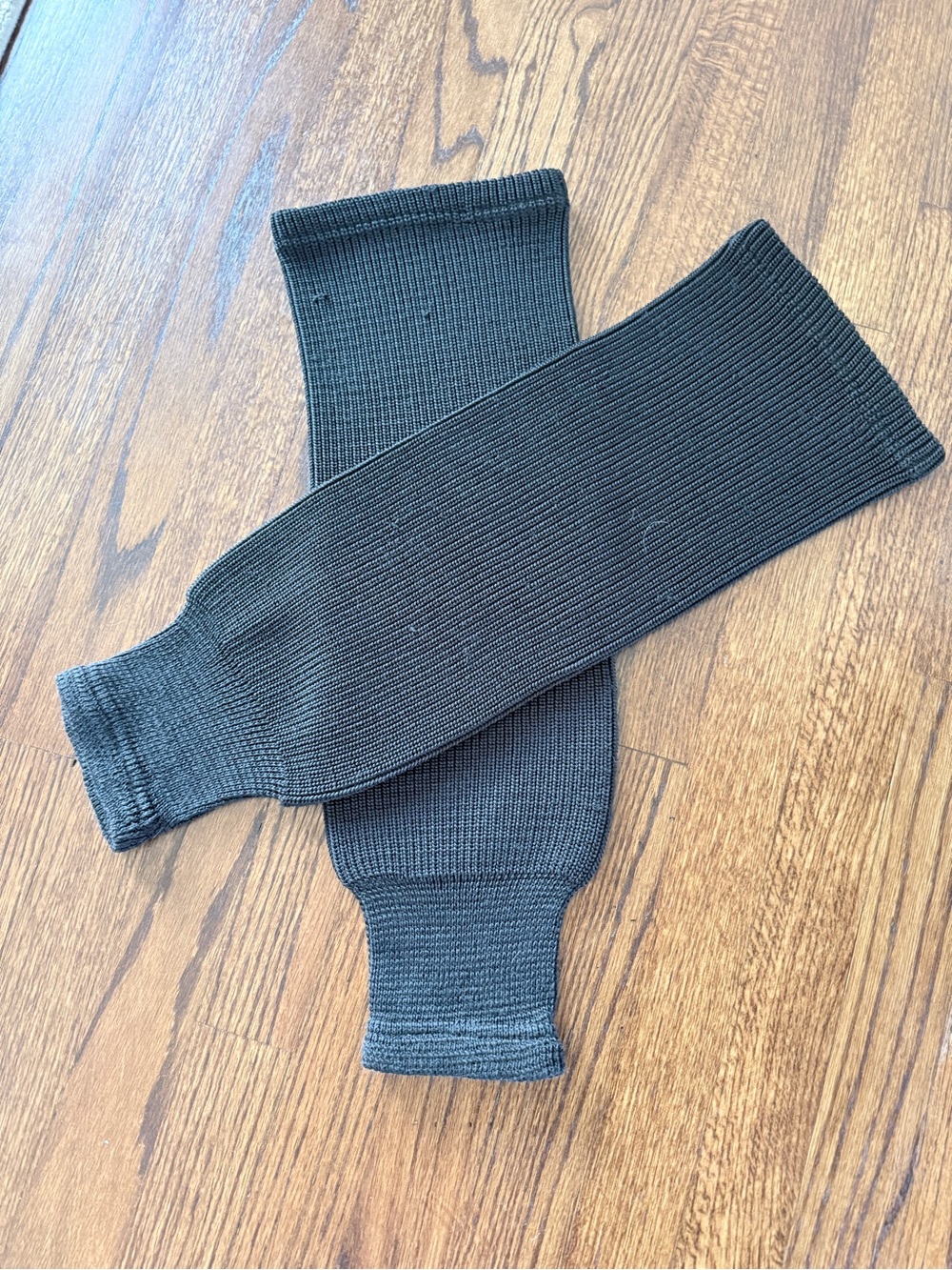 Kids hockey Black Ribbed socks, 24 inches long.